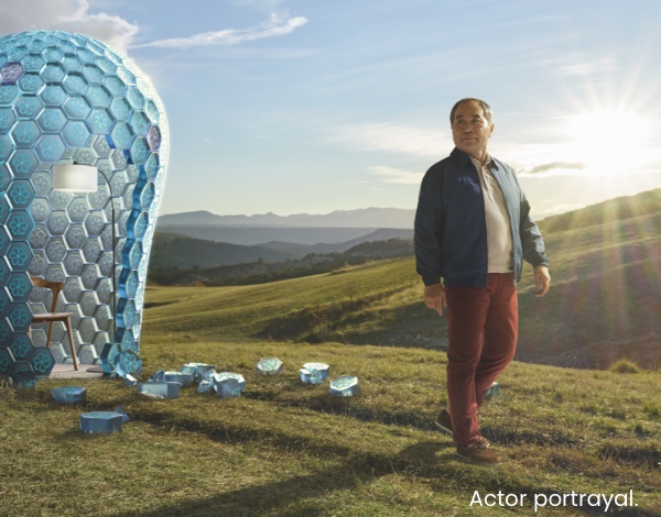 Image of an actor walking outside.